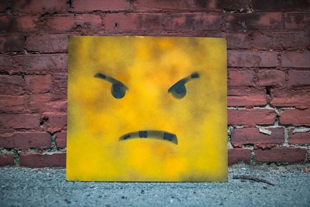 An angry-looking emoji artwork.