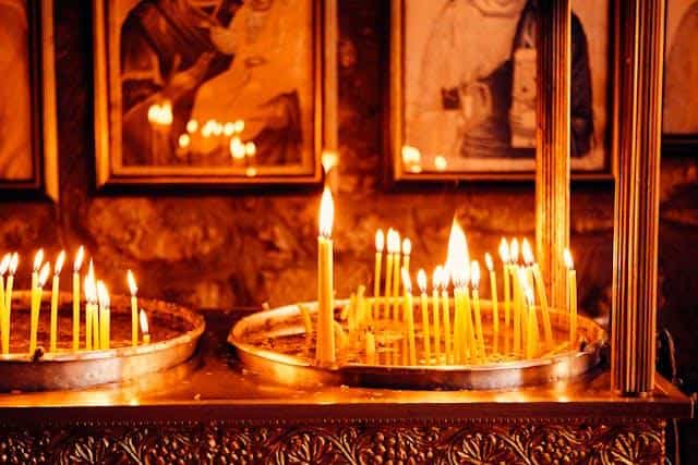 Close-up of burning candles at a Serbian funeral.