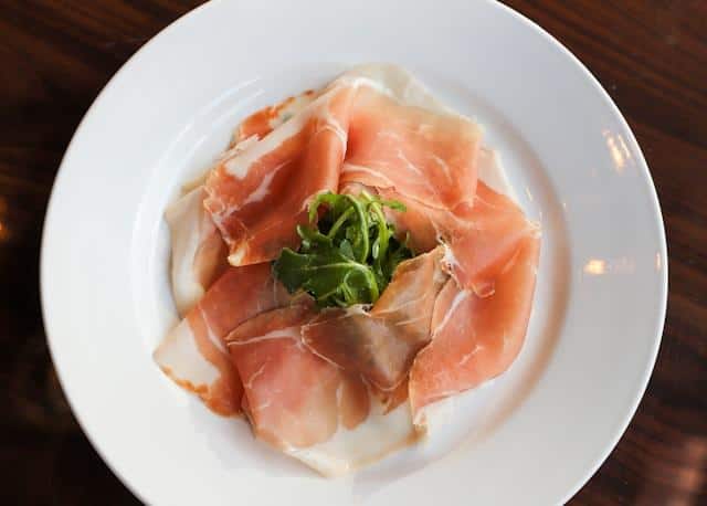 A plateful of prosciutto — one of the ingredients of Serbian meze.
